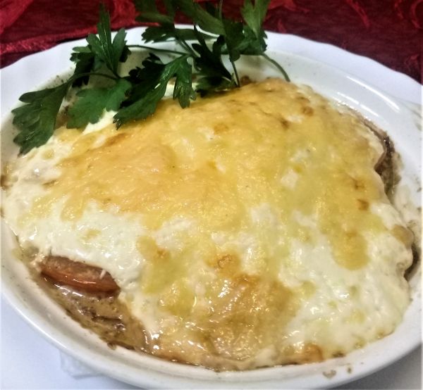 Кабачки, запеченные с помидорами