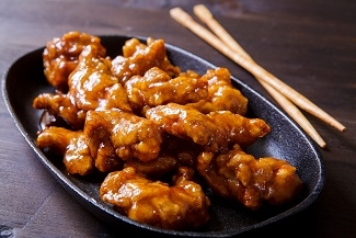 Свинина, жаренная в слабо-остром соусе