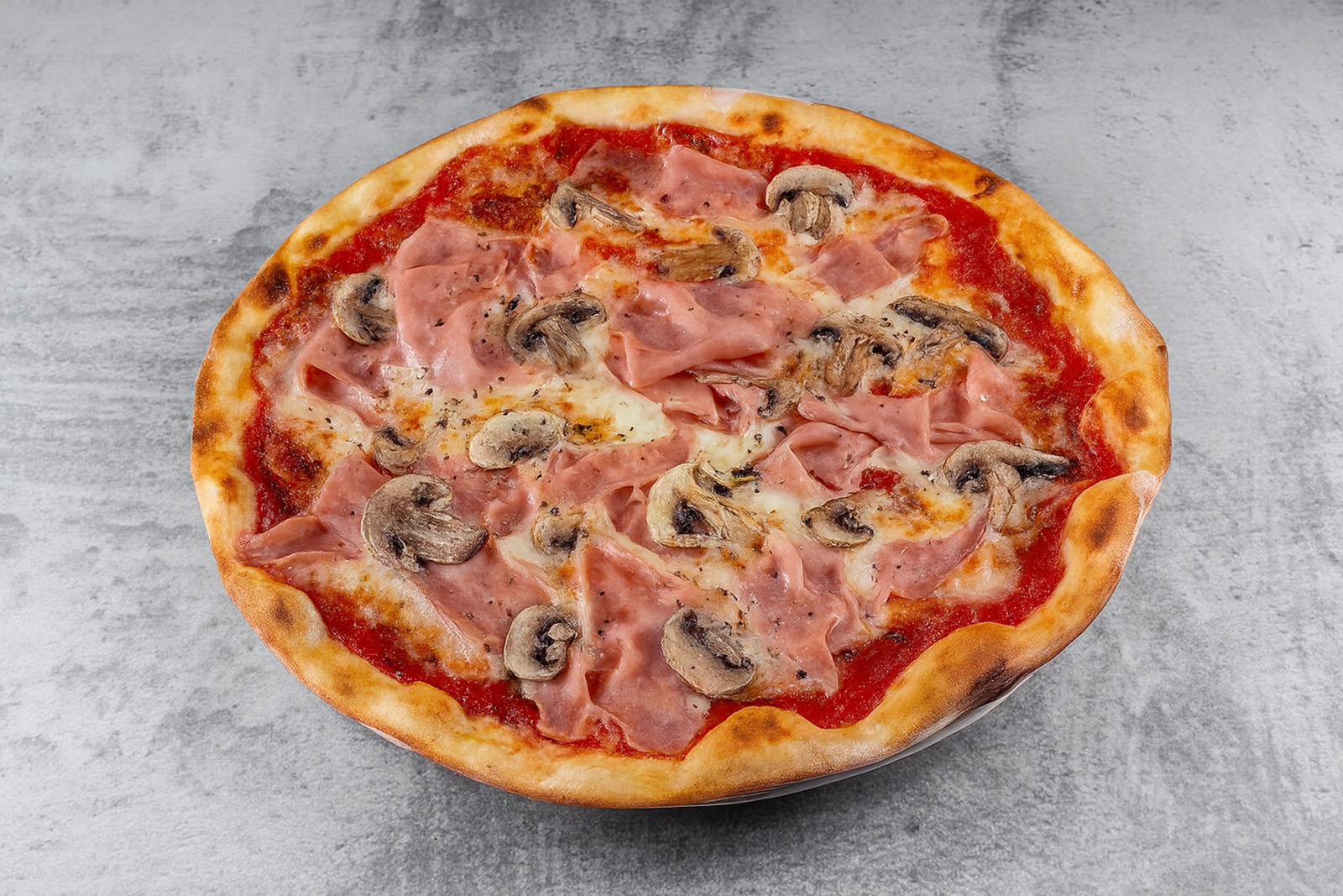 Пицца с ветчиной и грибами