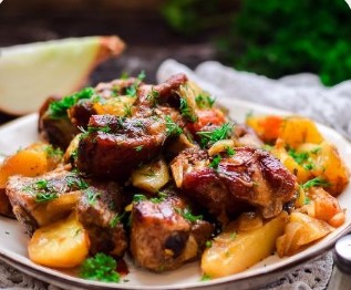 Свиные ребрышки с овощами