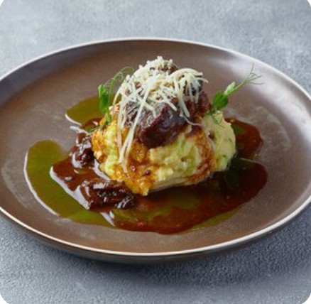 Телячьи щечки с черносливом