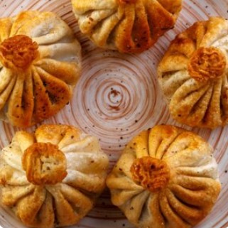 Хинкали с грибами жареные