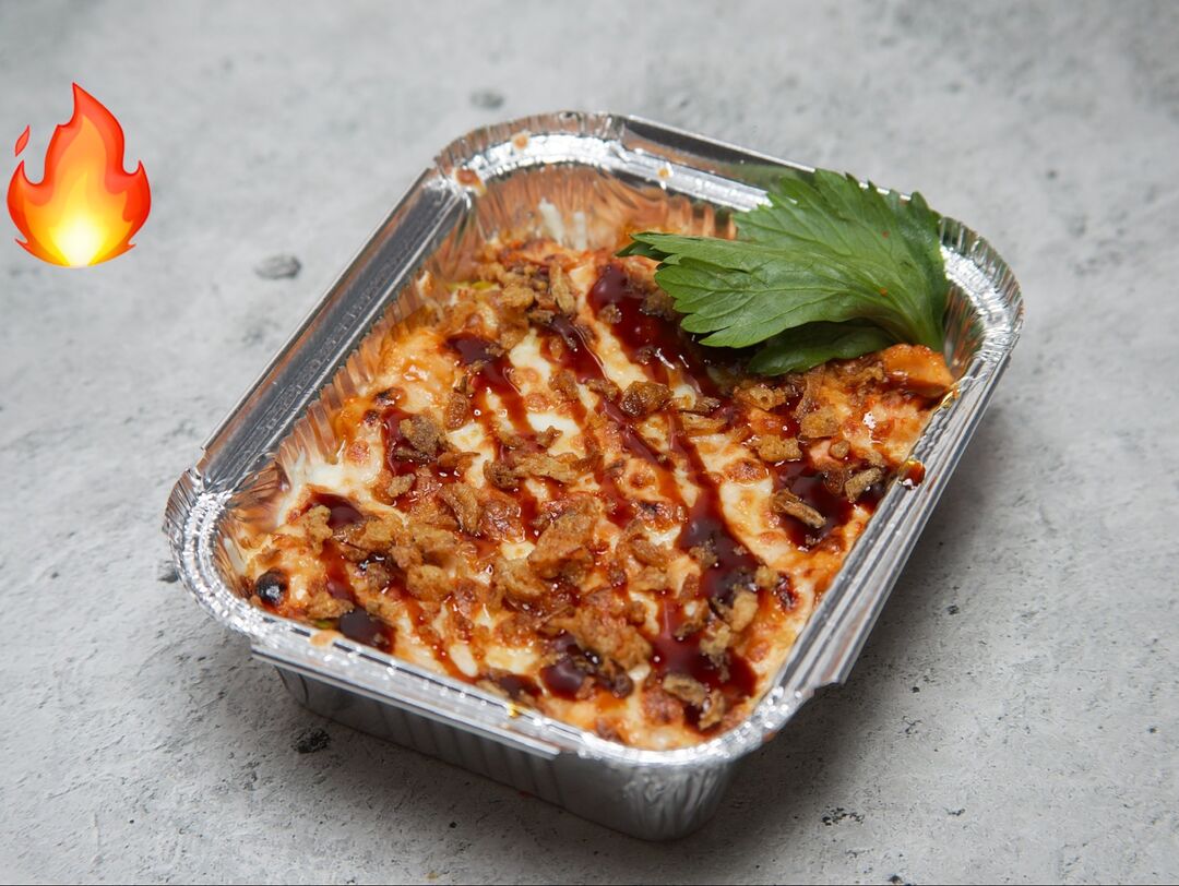 Лазанья с лососем рисом и сырной корочко