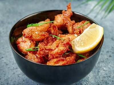 Куриные бедрышки карааге с имбир. соусом