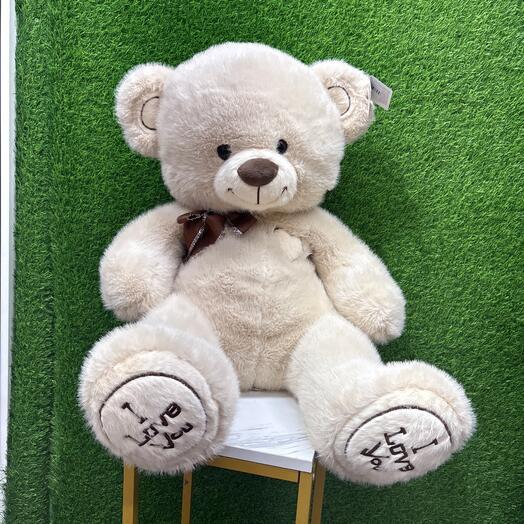 Медведь с коричневым бантиком