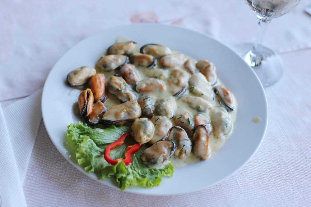 Мясо мидий в сливочном соусе