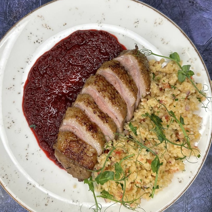 Утка с вишневым соусом и табуле с кускусом