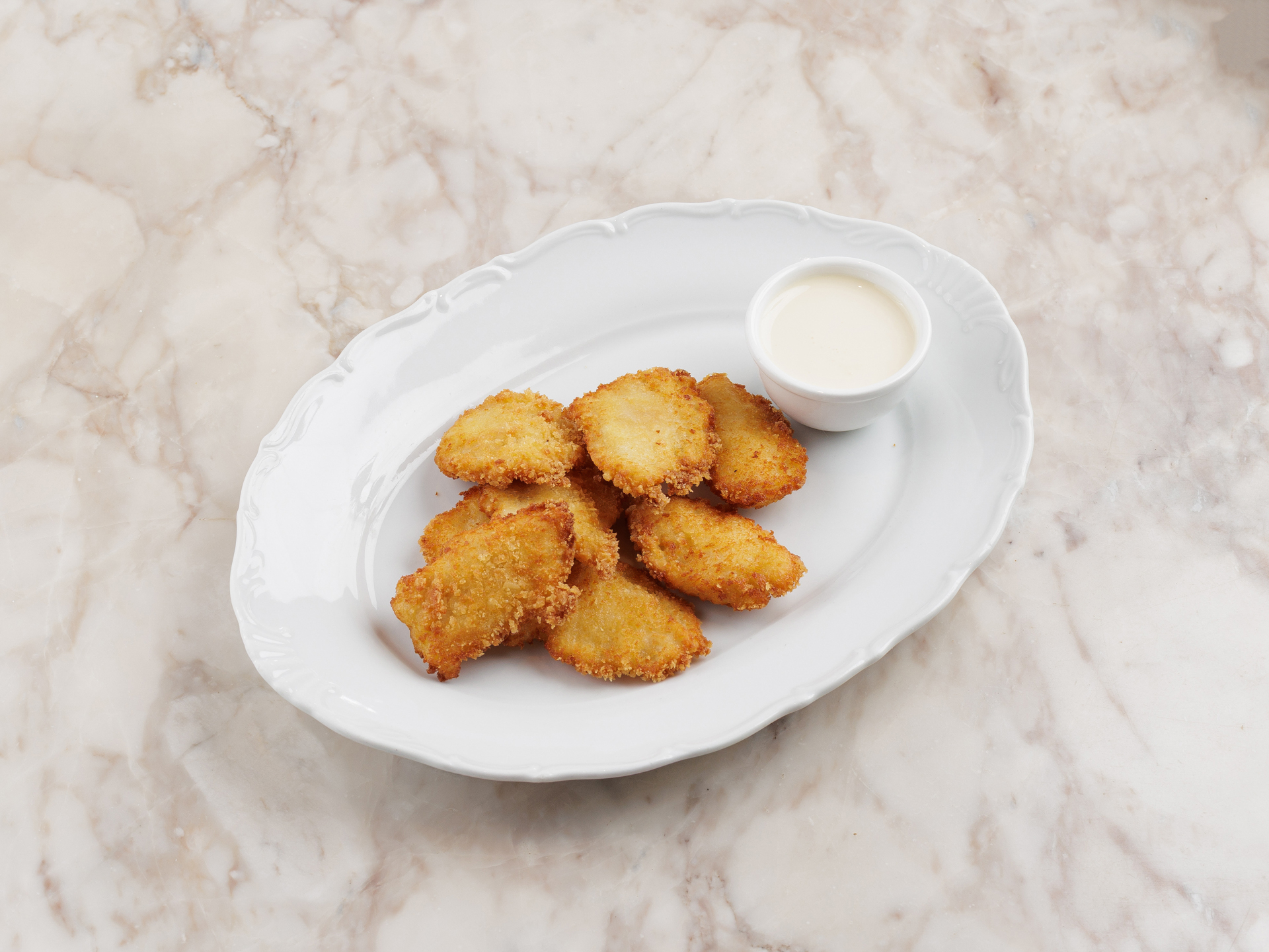 Куриные нагетсы с сырным соусом